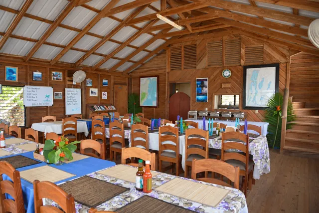 Wooden island dining room ready for guests