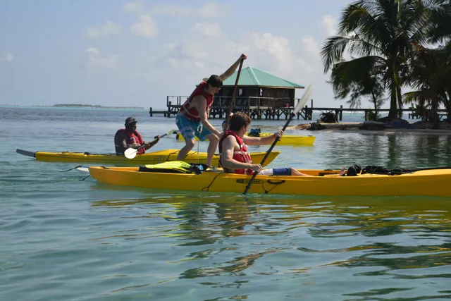 Kayakers waterfront — Isla Marisol Resort, Belize