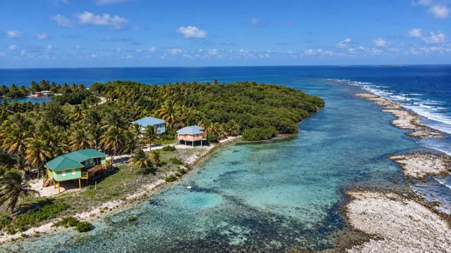 Aerial view of Southwest Caye and its reef coastline